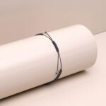 Bracciale unisex con perla di Tahiti da 9mm e dettagli in oro su cordino macramè - Genisi